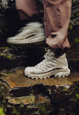 Hikers wearing Merrell Moab Speed 2 shoes on a rocky trail.